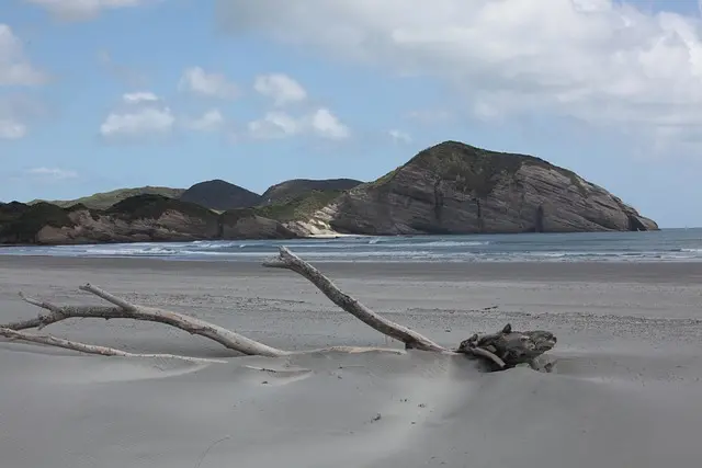 wharariki beach, new zealand, south island
